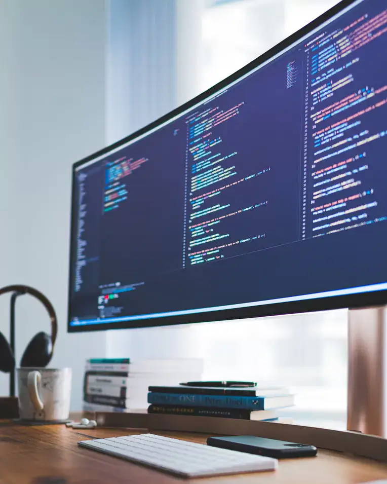 10 Ways to Drive Success with Software Testing Methodologies 4 Picture of coding on desktop computer
